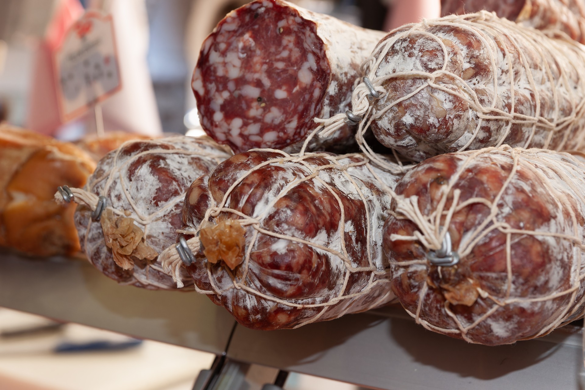 Traditionally Processed meat smallgoods in city market in Antibes, France.