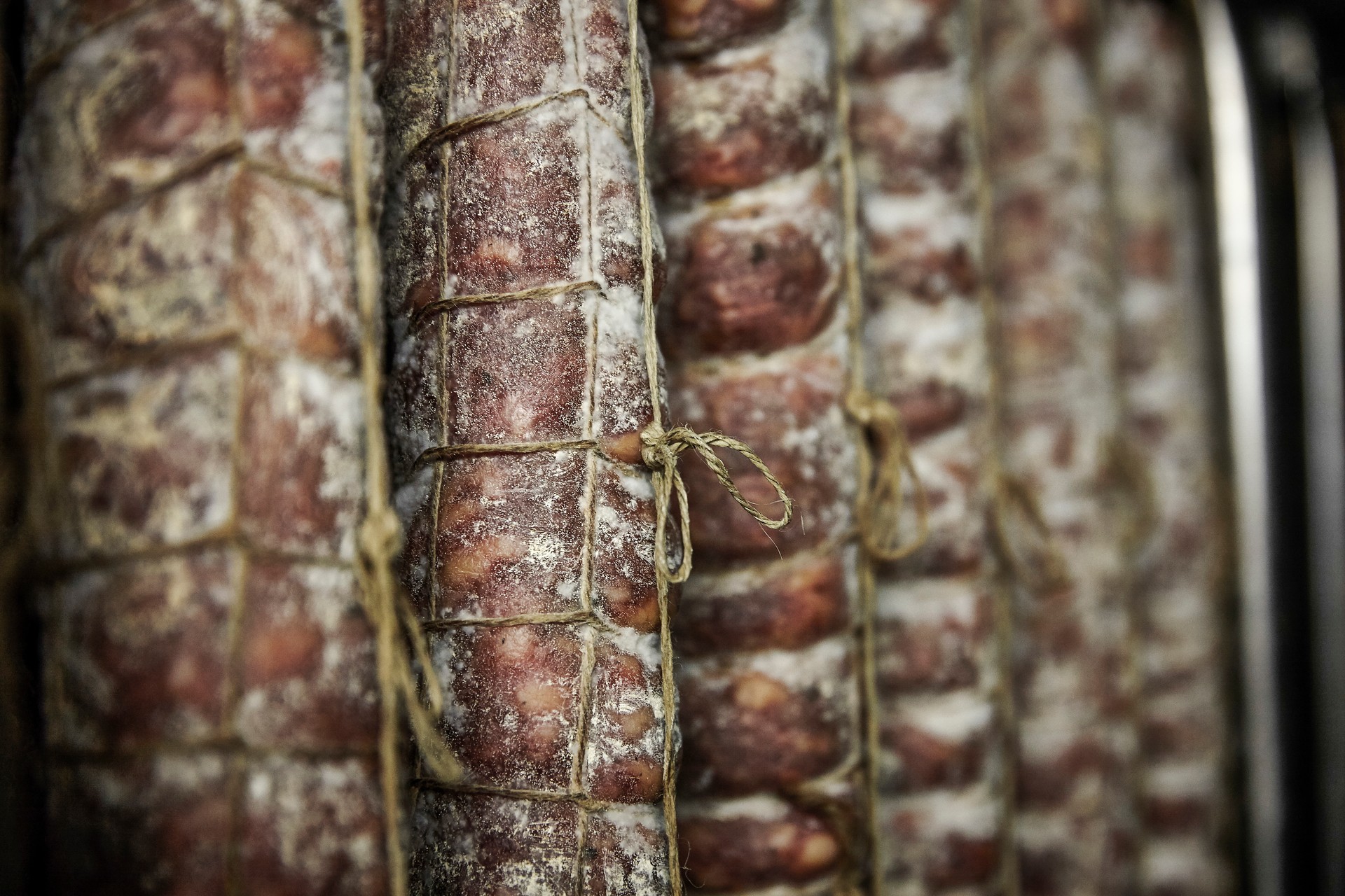 Salamies hanging in a storage room